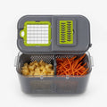 Coupe‑légumes multifonction compact avec récipient transparent intégré, poignées robustes et design moderne, idéal pour hacher et trancher facilement les légumes.