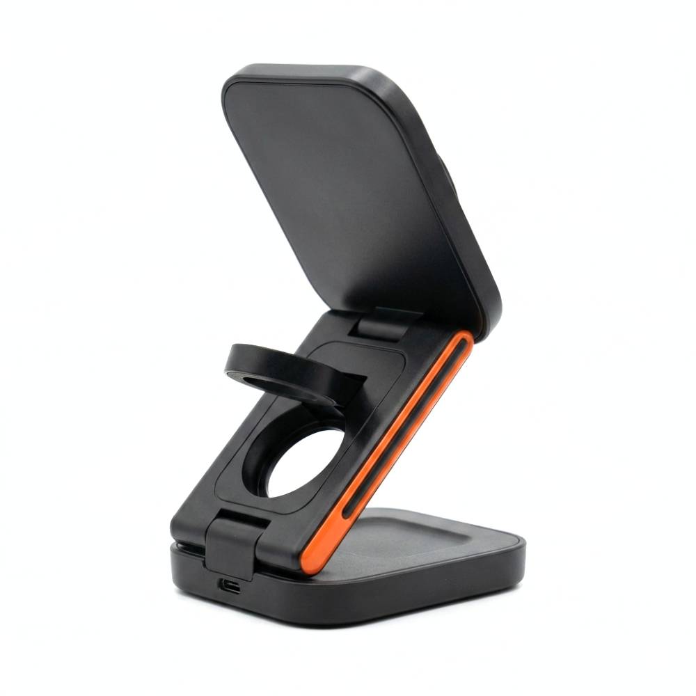 Station de charge sans fil pliable 3‑en‑1, noir et orange, pour smartphone, montre connectée et écouteurs.
